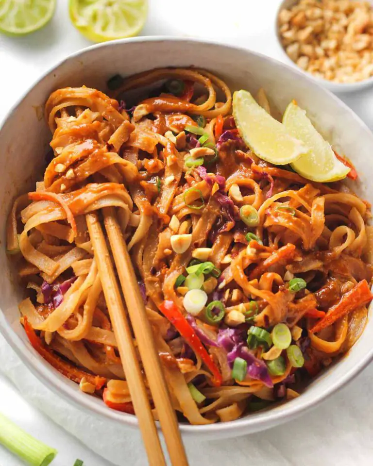 Creamy & Saucy Pad Thai Noodles recipe served in a bowl with chopsticks.