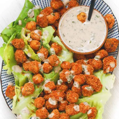 Crispy BBQ Chickpea Croutons recipe served in a bowl with ranch dip.