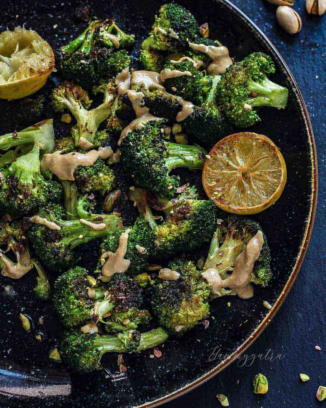 Oven-Roasted Broccoli with Pistachio Dukkah recipe served in a large bowl.