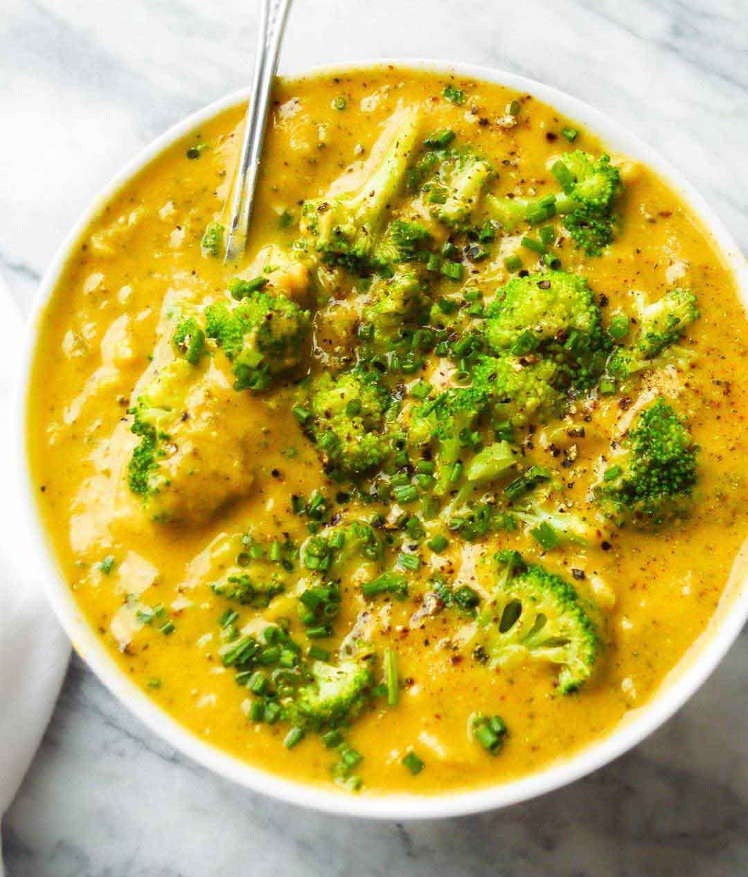 Vegan Broccoli Cheddar Soup recipe served in a bowl.