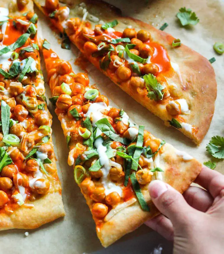 Vegan Buffalo Chickpea Pizza recipe served on a plate.