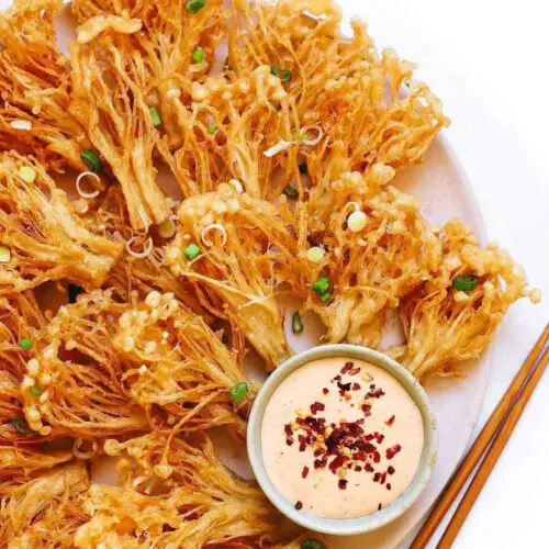 Crispy Enoki Mushrooms with Spicy Mayo recipe displayed on a plate with chopsticks.