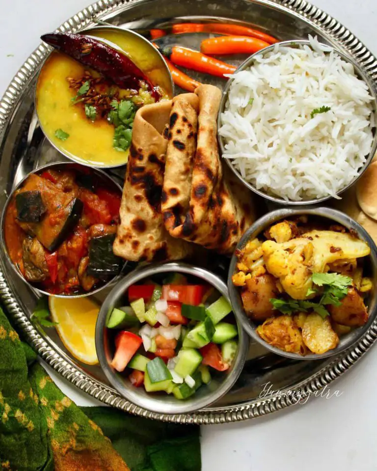 Plant-Powered Thali recipe served on a plate and in bowls.