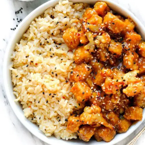 Orange-Sesame Tofu & Cauliflower recipe served in a bowl.