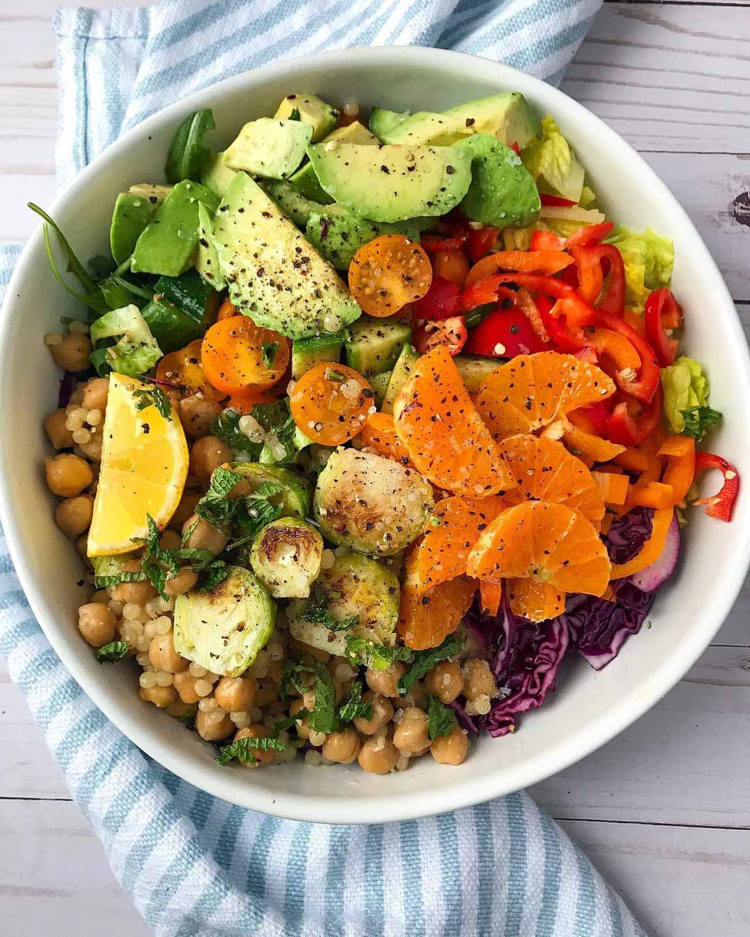 Warm Chickpea & Brussels Sprouts Couscous Salad recipe served in a bowl.