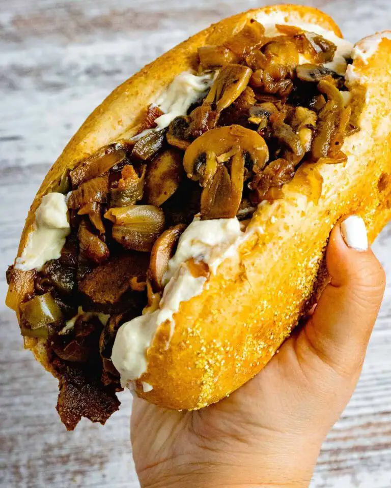 Vegan Philly Cheesesteak Sandwich recipe hold in hand.