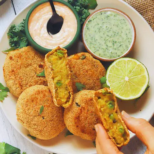 Aloo Tikki (Potato Croquettes) recipe served on a plate with dips.