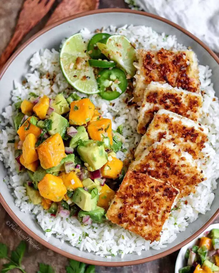 Coconut Panko Crusted Tofu with Mango Avocado Salad recipe served on a plate with rice.