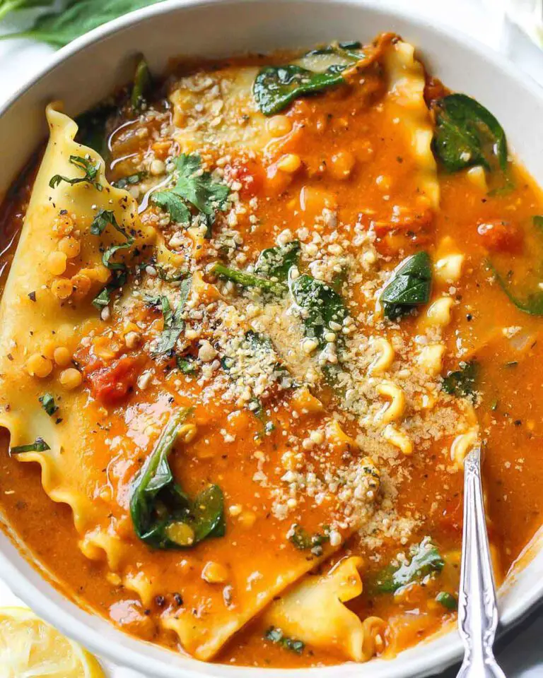 Easy 1-Pot Creamy Lasagna Soup recipe served in a bowl with spoon.