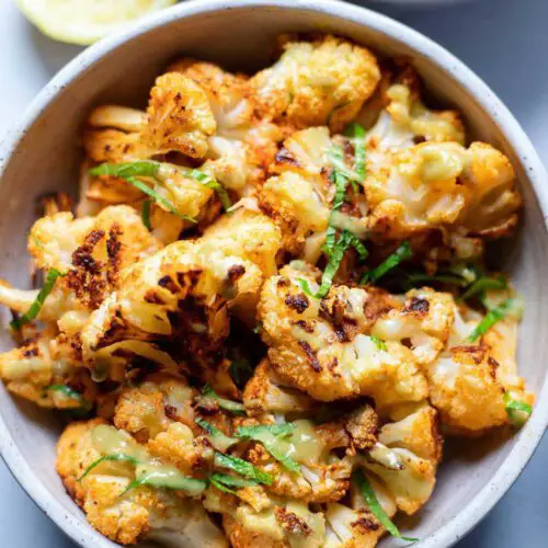 Simple Roasted Cauliflower recipe served in a bowl.