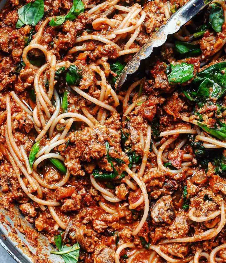 Spaghetti Bolognese with Walnut Tofu Meat recipe displayed in a large pan.