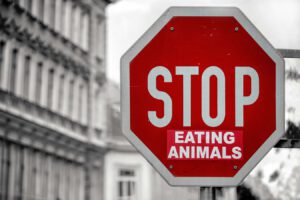 A traffic sign saying: "Stop Eating Animals"