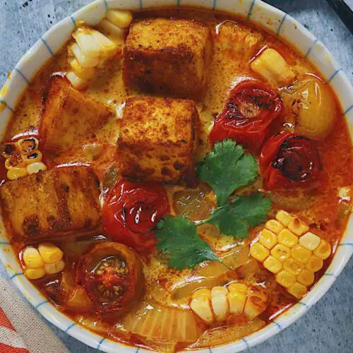 Tofu Curry & Roasted Summer Vegetables recipe served in a bowl.