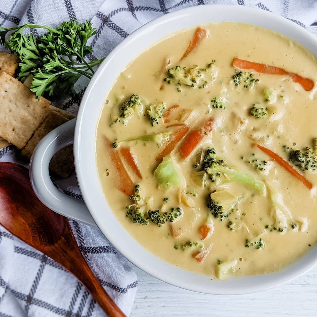 Vegan Cheese & Broccoli Soup recipe served in a bowl.