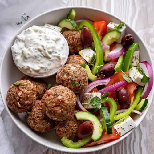 Vegan Greek Meatballs with Tzatziki recipe served in a bowl.