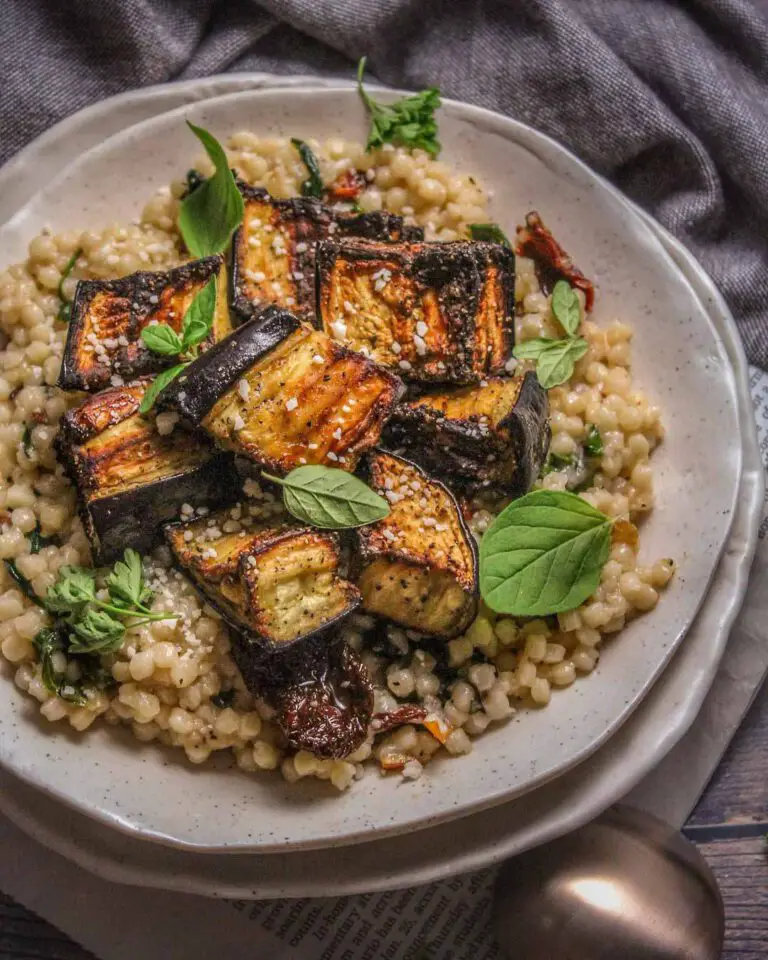 Crispy Roasted Aubergine with Creamy Couscous recipe served on a plate.