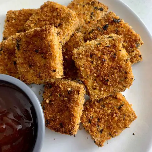 Crispy Tofu Nuggets recipe served with ketchup.