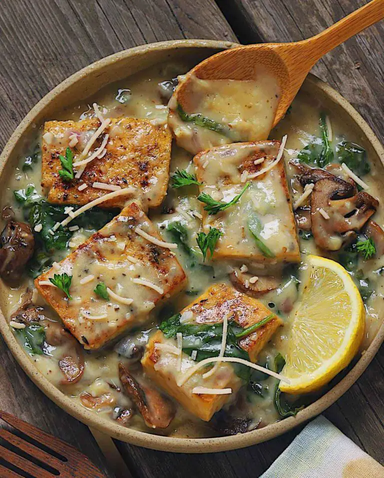 Tofu & Mushroom Cheezy Florentine recipe served in a bowl.