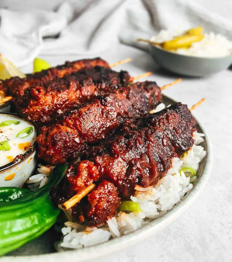 Vegan BBQ Skewers recipe served with rice and dips.