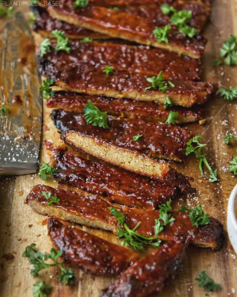 Vegan Barbecue Ribs recipe served on a wooden plate.