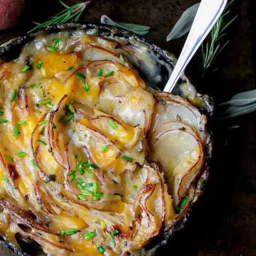 Garlic Herbed Scalloped Potatoes recipe served in a bowl.