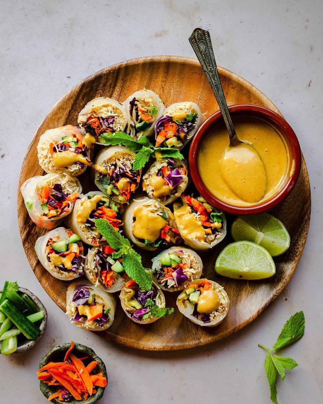 Vietnamese Spring Rolls with Mango Almond Butter Sauce served on a plate.