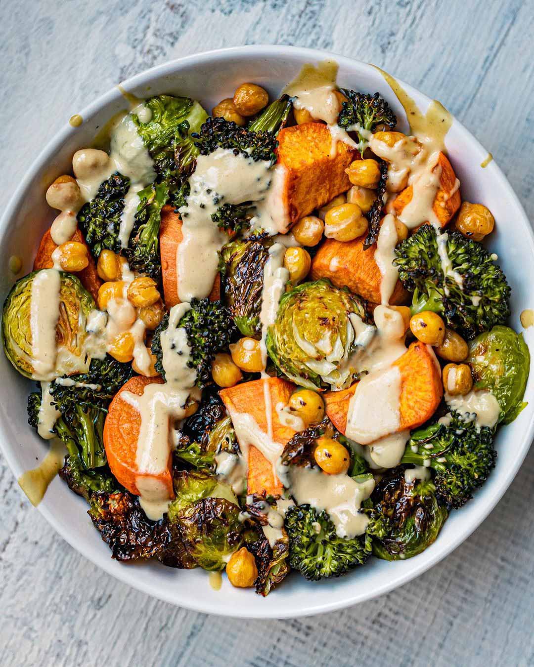 Sheet Pan Chickpea Veggie Roast with Tahini Maple Dressing recipe served in a bowl.