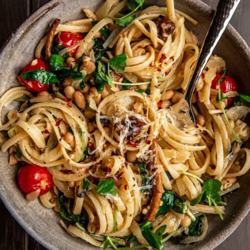 Linguine with Onion and Tomatoes recipe served in a large bowl.