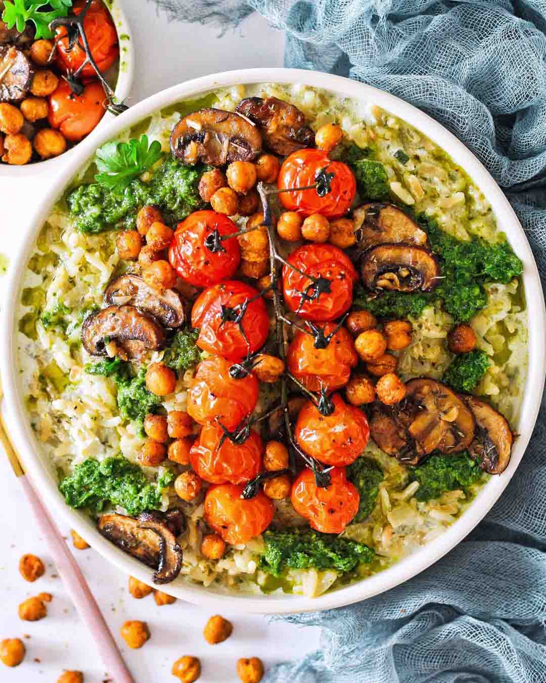 Pesto Risotto with Miso Butter Mushrooms recipe served in a bowl.